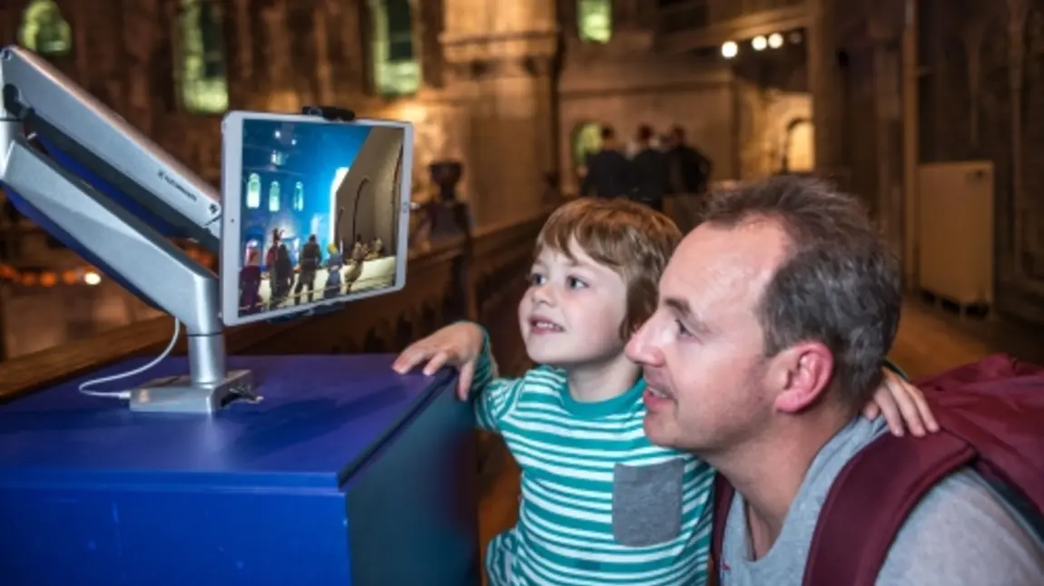 Adult and child at a museum