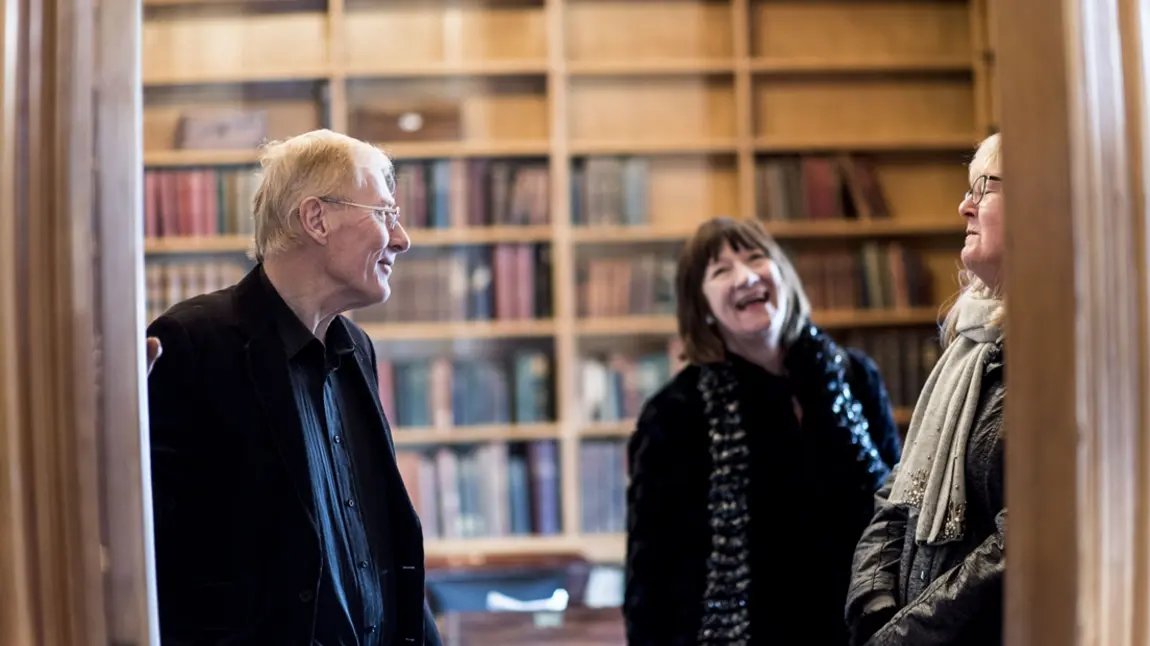 Nicholas shows visitors around Elizabeth Gaskell House