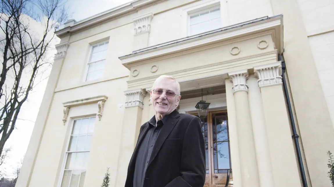 Nicholas outside Elizabeth Gaskell House