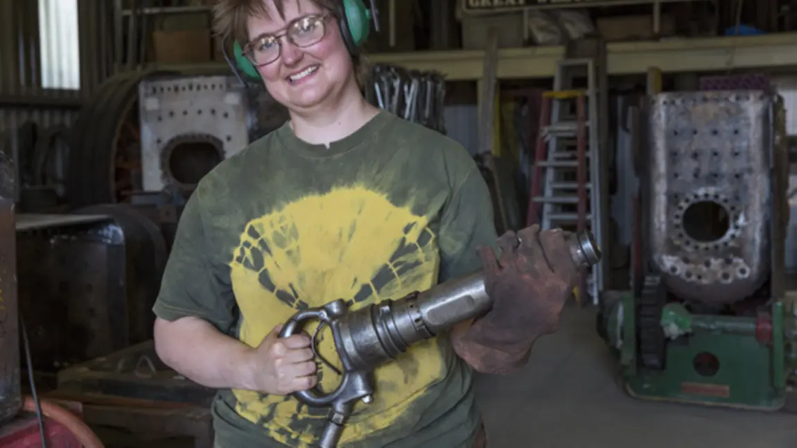 Woman working as a boilersmith