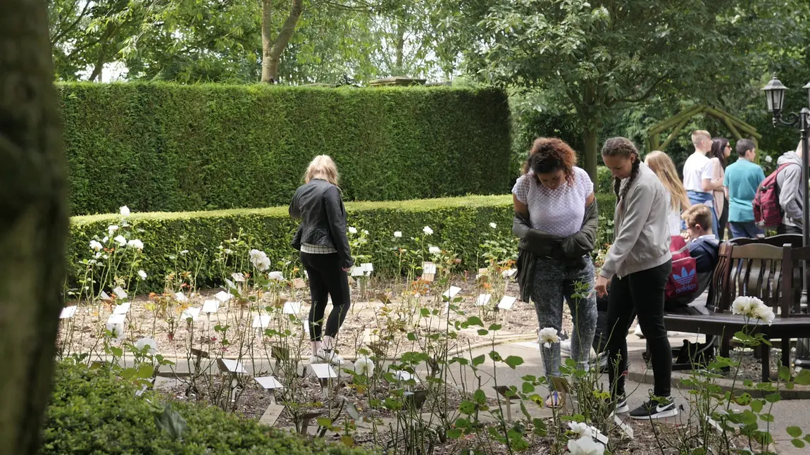 Schoolchildren look around the grounds of the Holocaust Centre