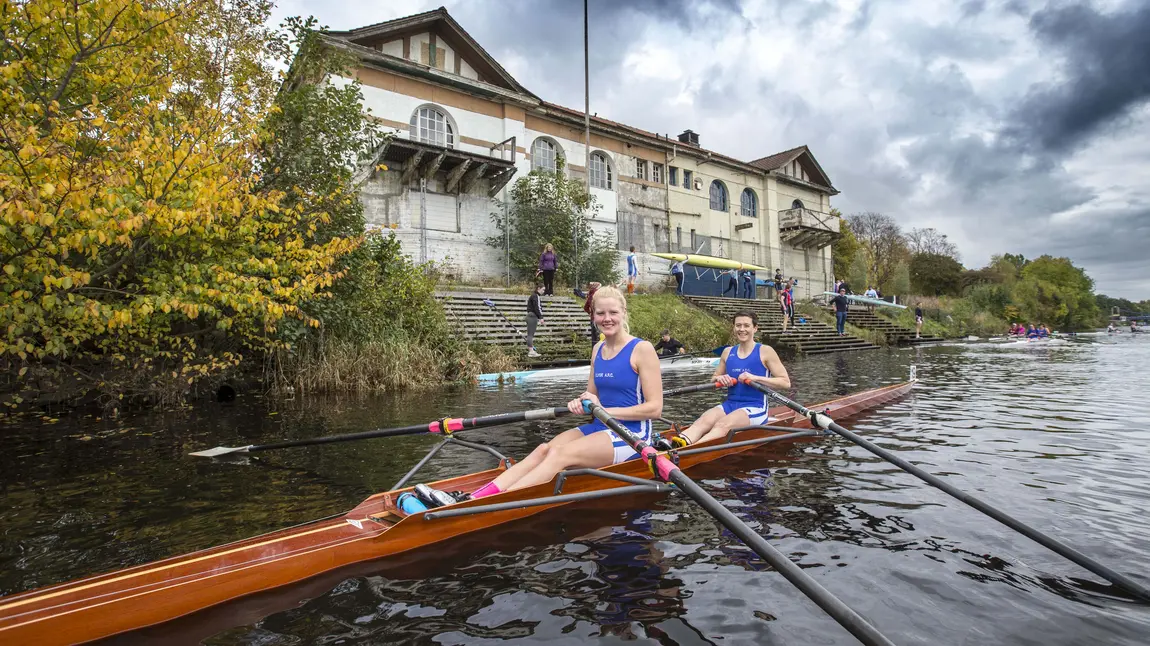 HLF support keeps Boathouse hopes afloat Polly Swann and Caitie Gorton-Phillips in a boat in front of the boathouse