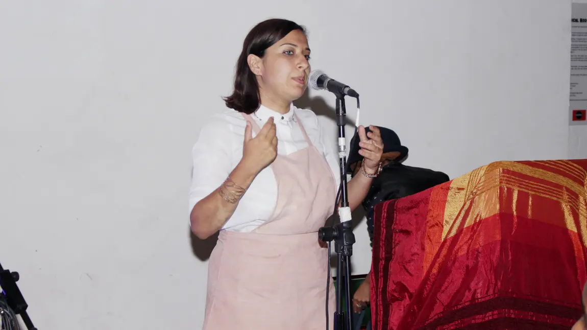 Anisa Haghdadi speaks at the final Routes2Roots event