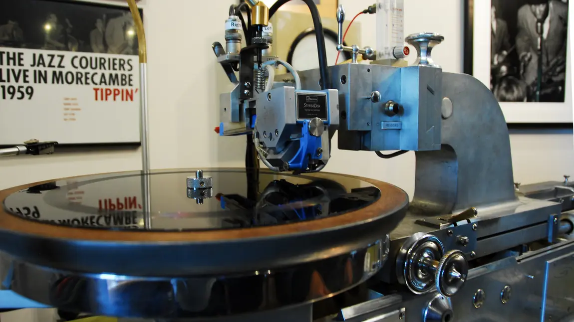 A vinyl record being cut