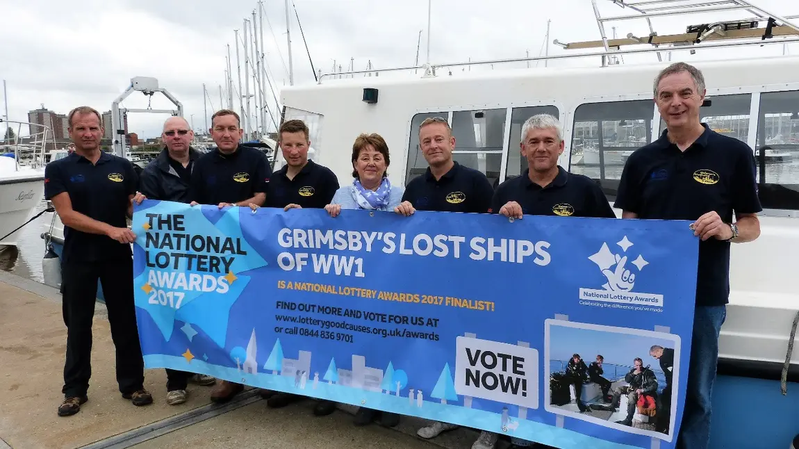 Changing lives: Linda pays tribute to great grandfather Linda with the dive team on the quayside alongside the Humber Heritage boat