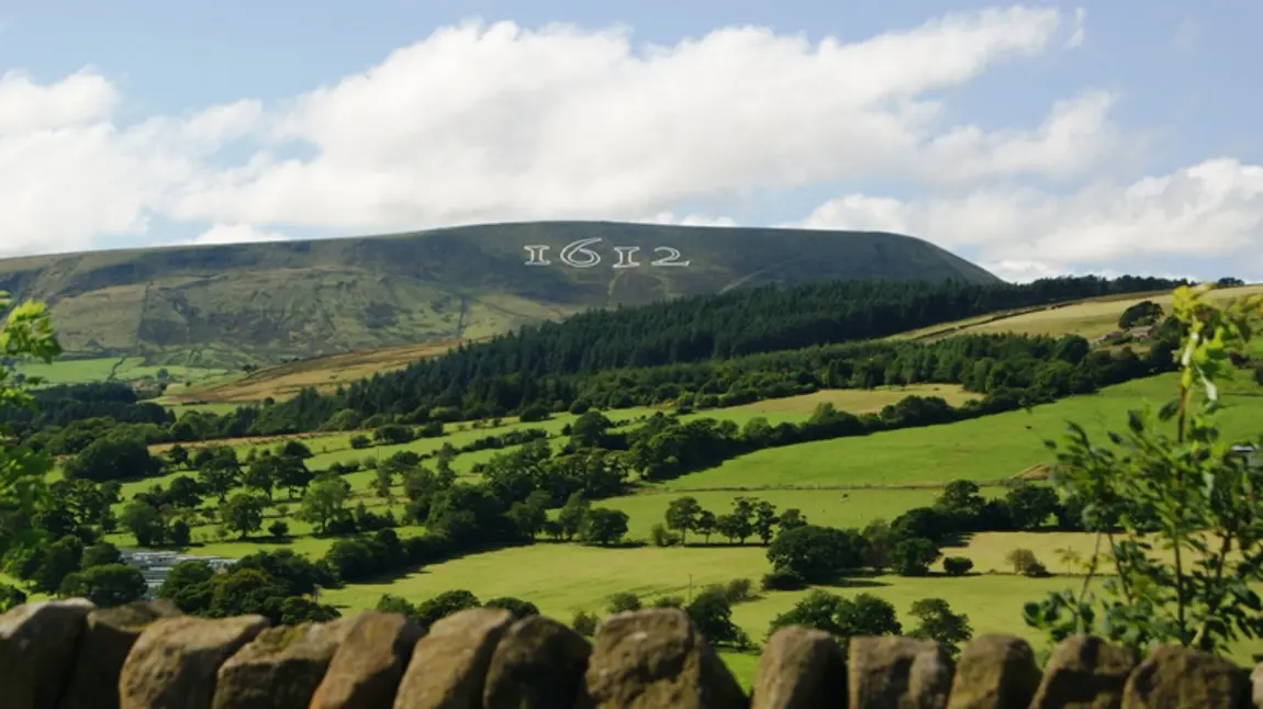 Part of Pendle Hill carved with 1612