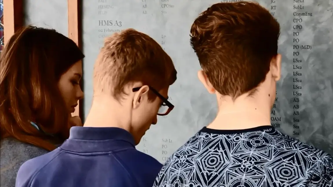Young people exploring the names listed on a Gallipoli war memorial