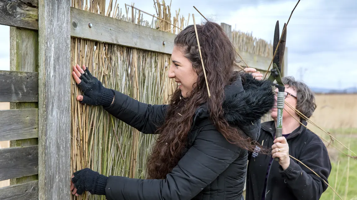 Changing lives: childhood walks lead Elinor on her way to bee saviour career Elinor helps her grandmother to fix a shelter at the reserve