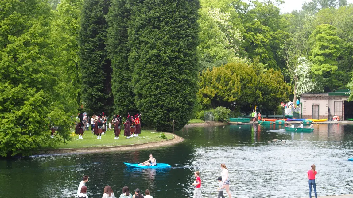 People enjoy the sun in Thompson Park, Burnley