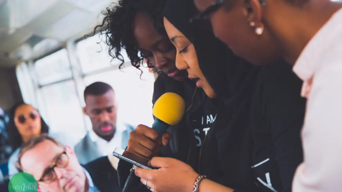 Young people share poetry on the Routes2Roots bus tour
