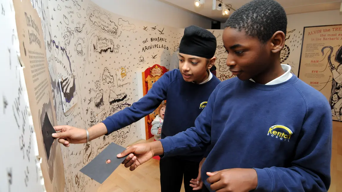 Schoolchildren enjoying the Seven Stories exhibition