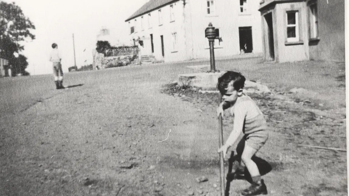Two small boys in the street in Carrickmore in the 1940s