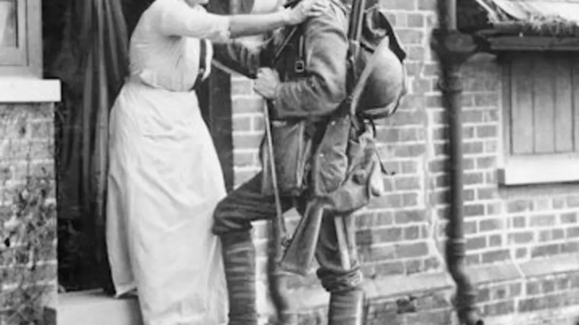 A soldier saying goodbye to his mother