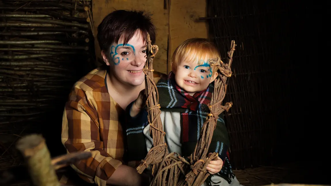 Mother and son in Iron Age dress