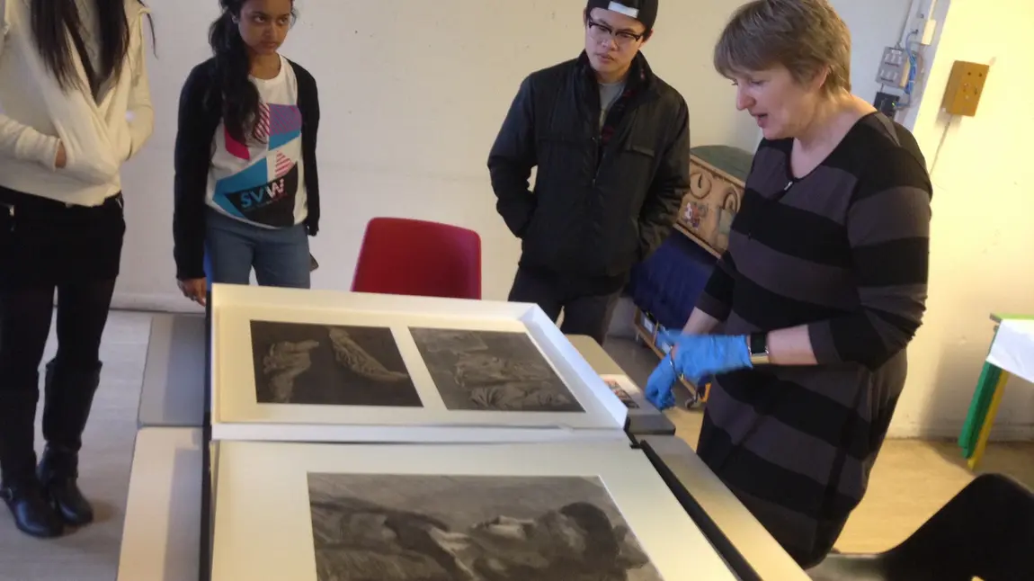 An abundance of merriment is announced at Nottingham Castle Students looking at Nottingham Castle's archive material