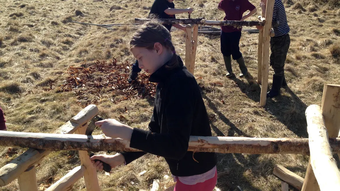 Young people making peat spade handles for the Talking Turf project