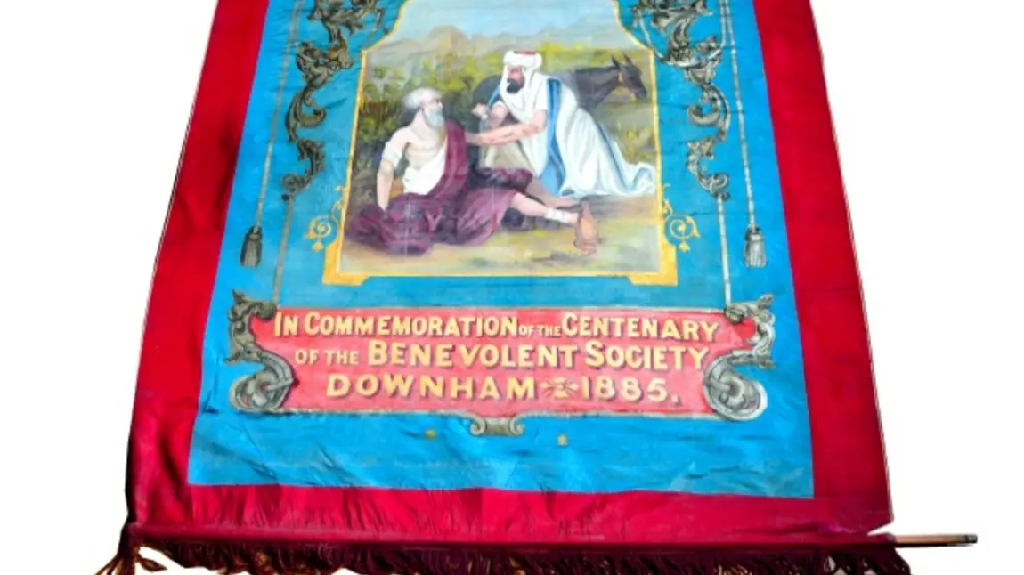 The banner in need of repair and conservation