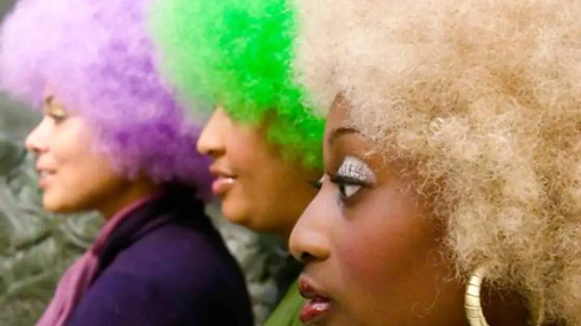 Women proudly wearing their diverse wigs