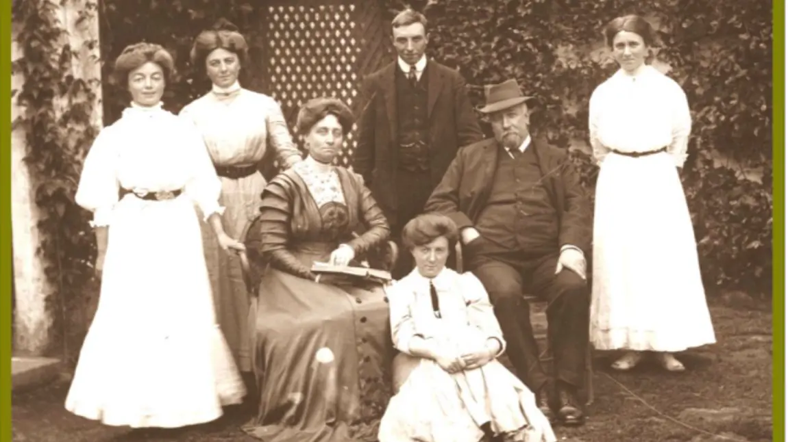 The Caldwell family posed outside a building c.1908