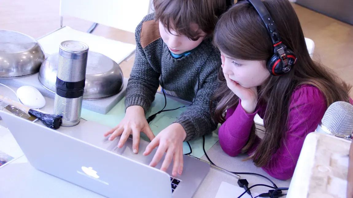 Children use a computer