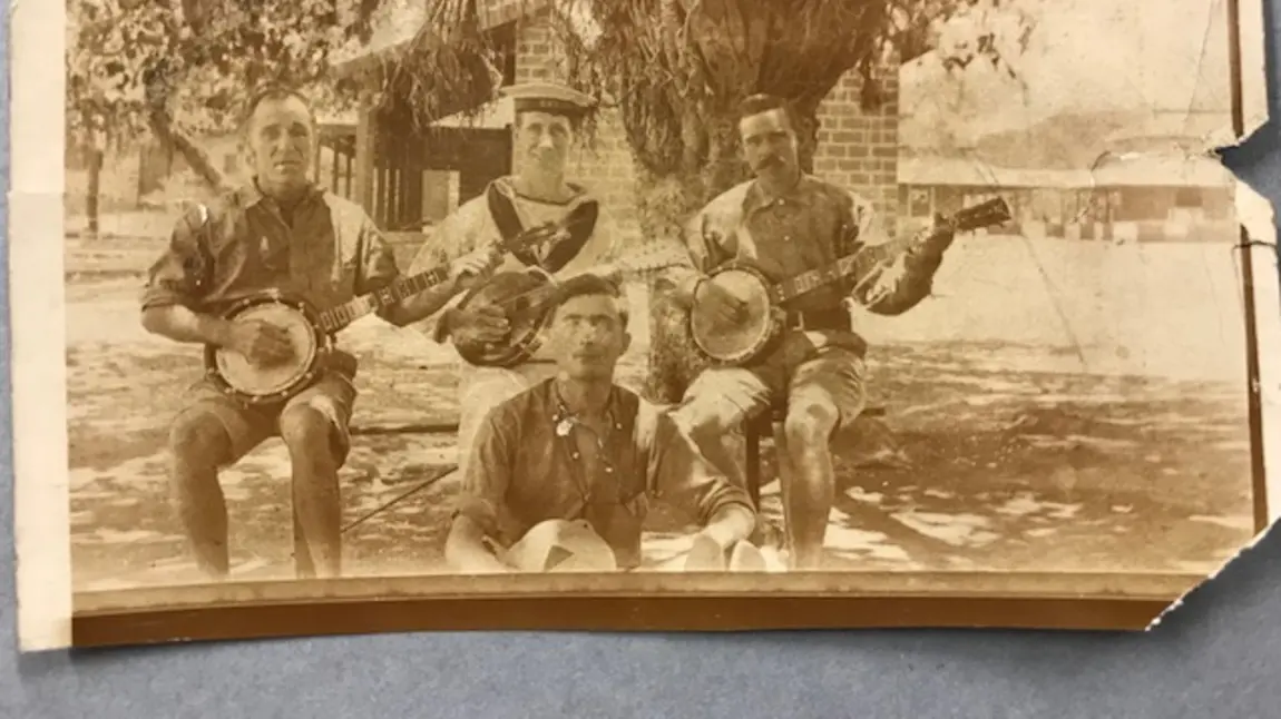 Sepia photograph of sailors