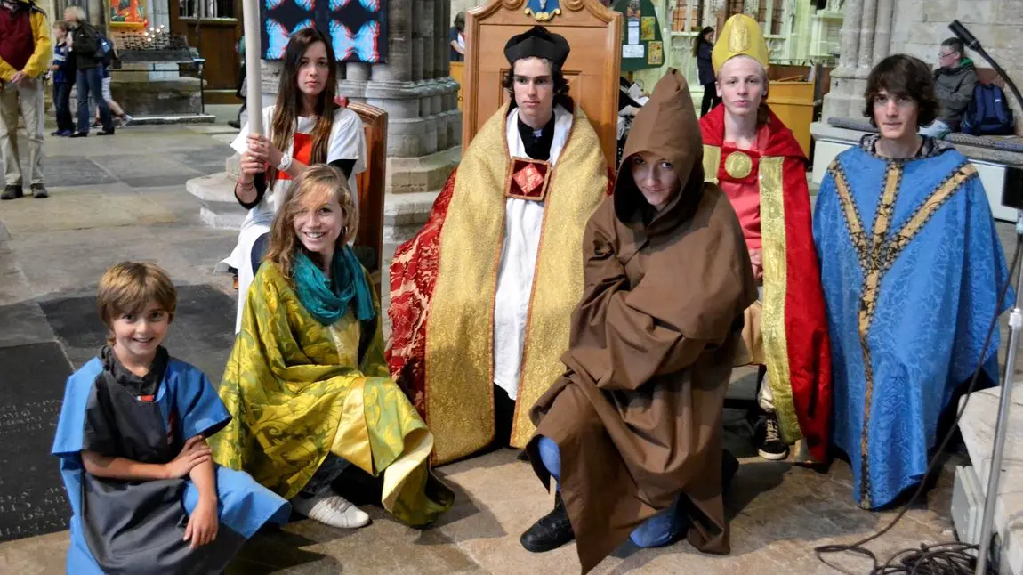 Young people in costume at Exeter Cathedral
