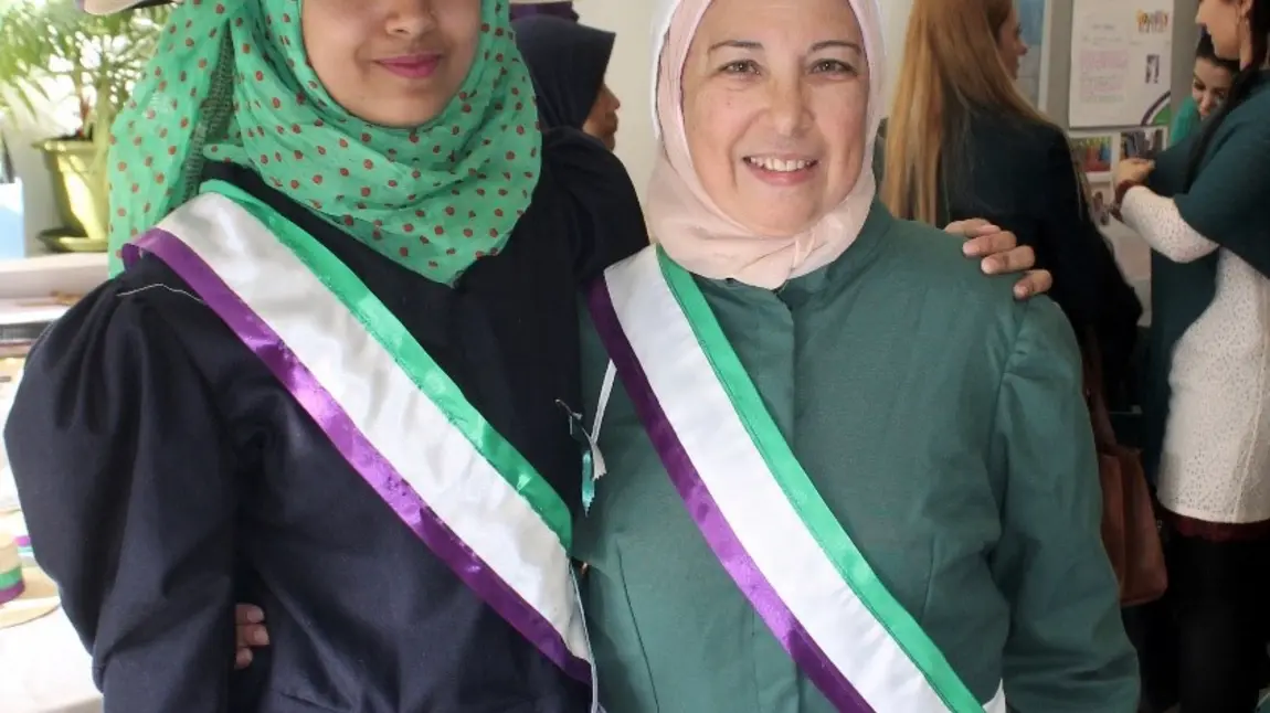 Participants dressed up as suffragettes during a project event