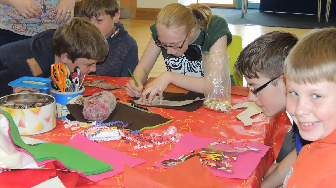 Members of Sight Support Derbyshire creating a tactile banner 