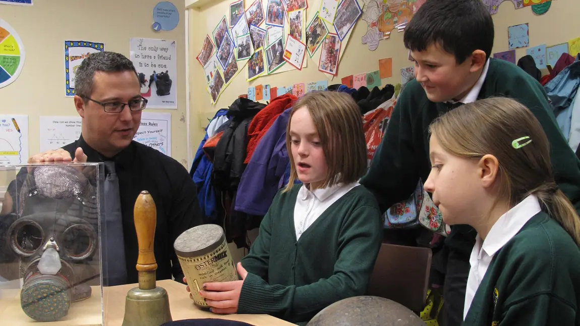 Children viewing First World War objects at a Green Howards Museum outreach event