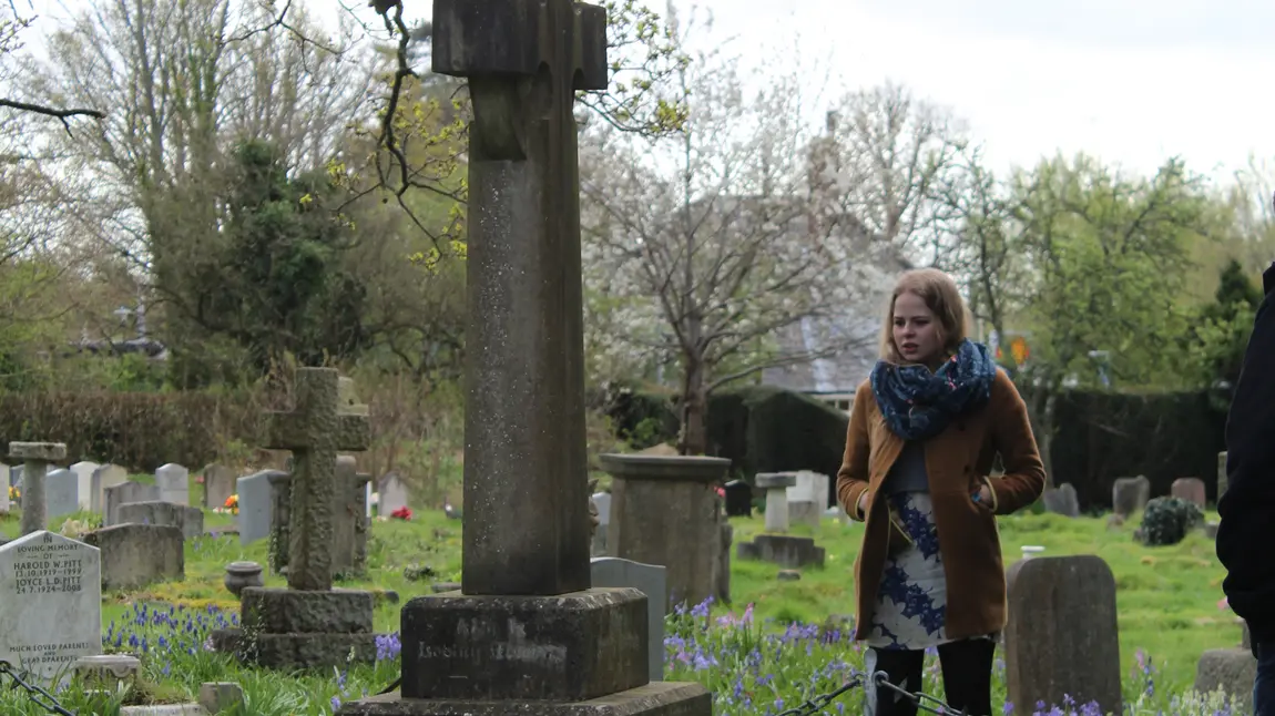 Student Holly Patrick, presenter of the Havant’s Heroes film at the grave of Sir Frederick Fitzwygram, one of the soldiers featured in the film