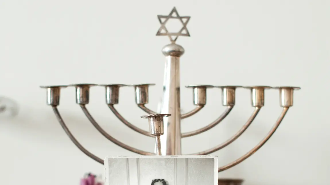 A menorah and wedding photograph from the Let The Elders Speak project.