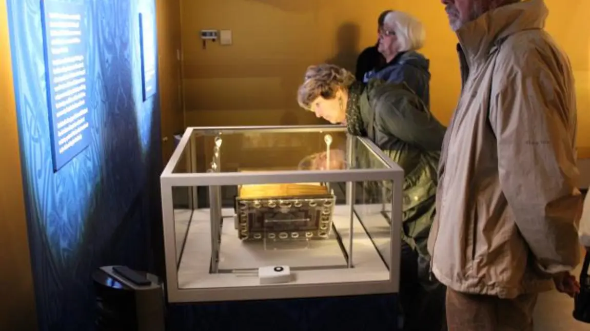 Visitors view the Lindisfarne Gospels