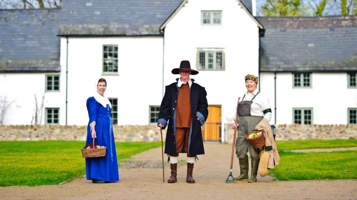 People in costume outside Llanyrafon Manor Rural Heritage Centre
