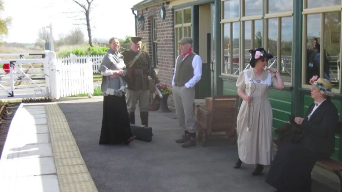 People in historic dress at Scruton Station