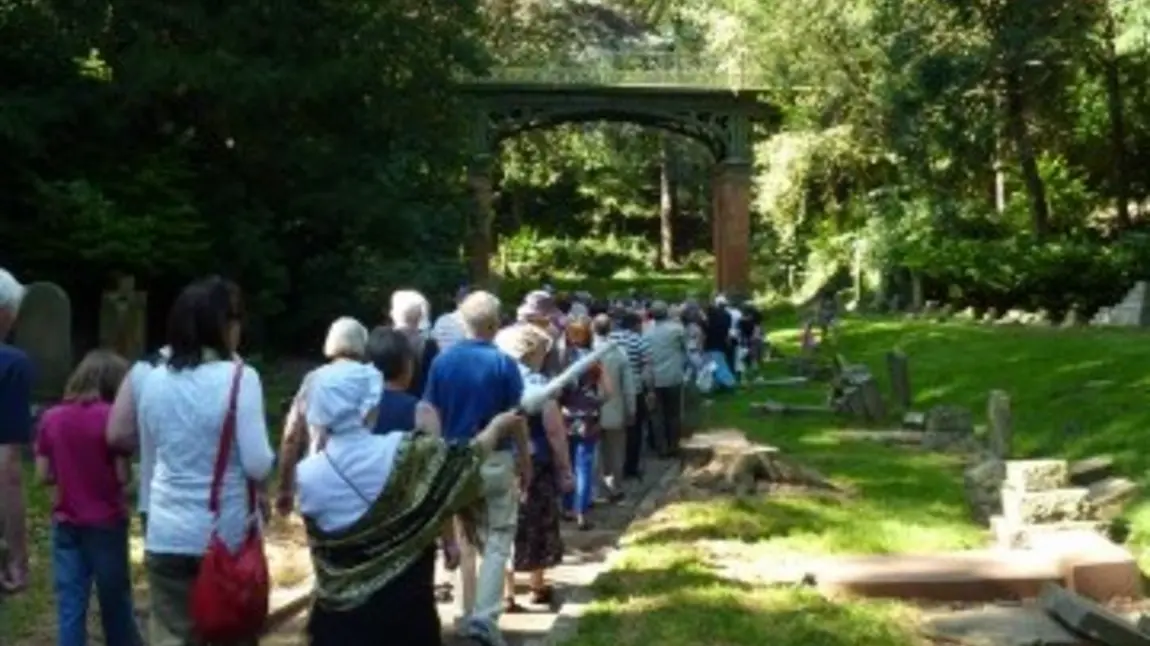 People on a guided walk to the Secret Garden