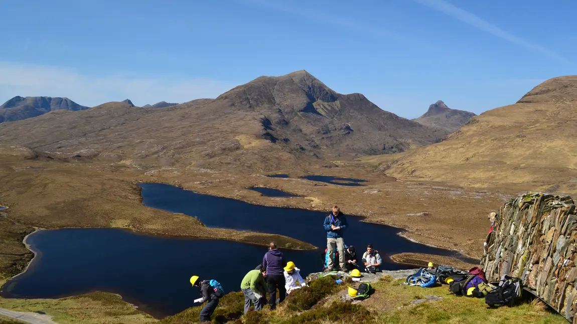 Volunteers learn more about the dramatic landscapes at Knockan Crag.