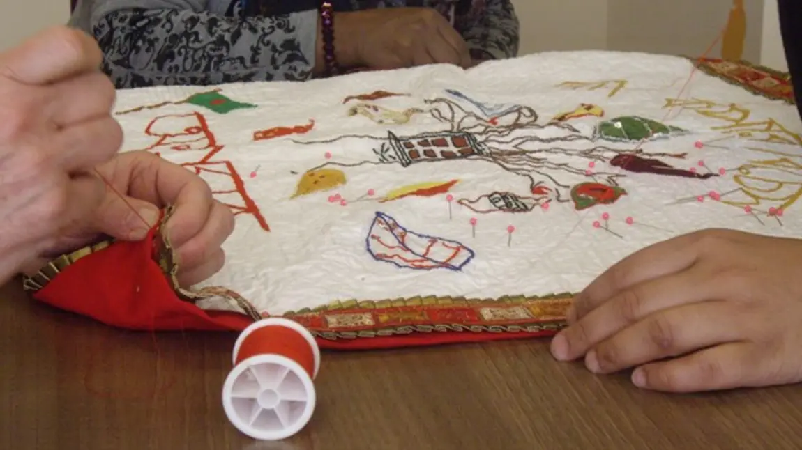 Women stitch a story into a traditional Bengali quilt