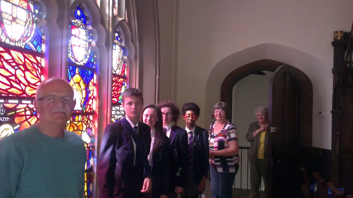 Friends of Stoke Minster with the newly restored First World War memorial window