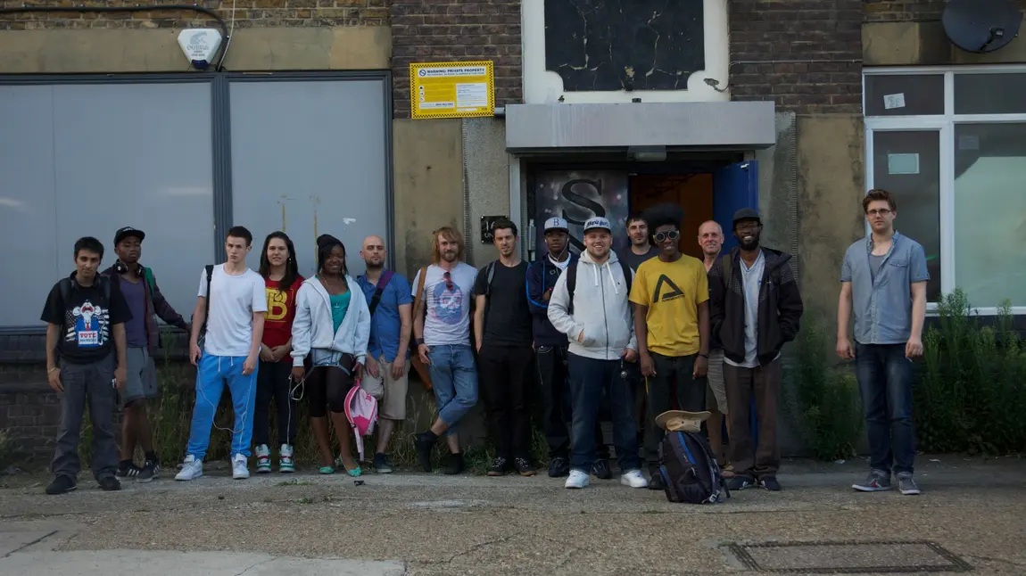 Young people involved in the project stand outside the studio