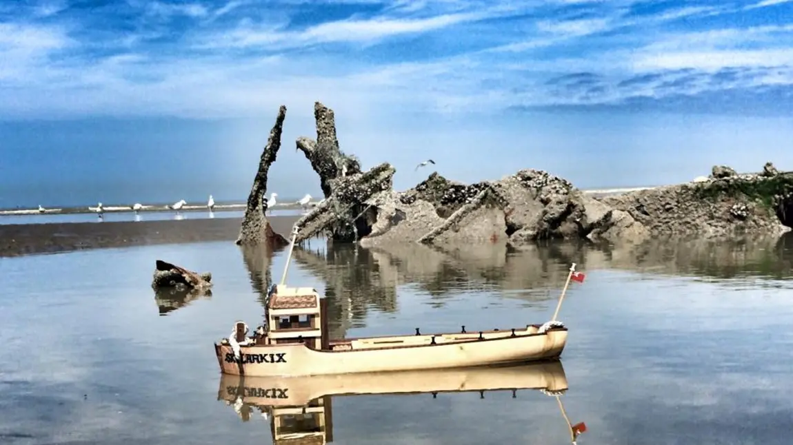 A model of a boat on water