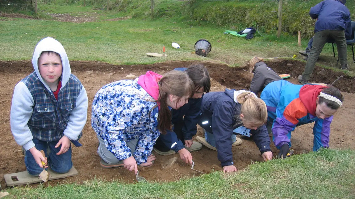 Children take part in an excavation
