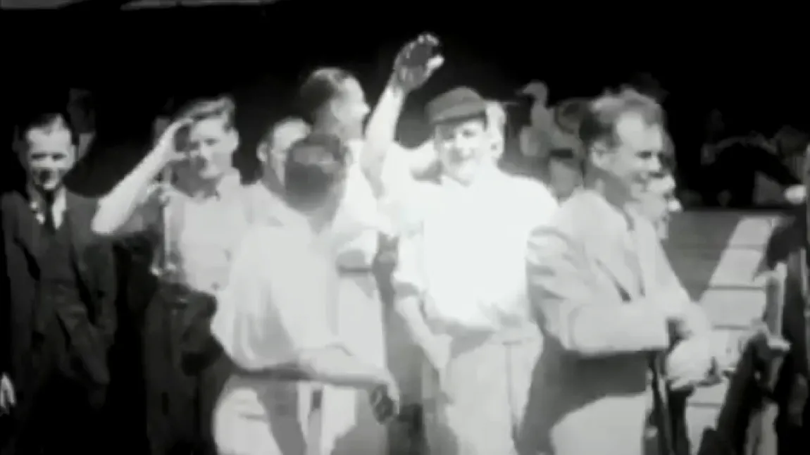 Archive footage of Gloria's late father, Arthur King
