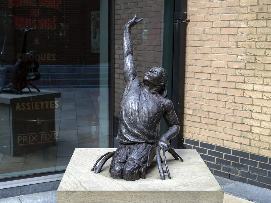 The sculpture Winning Shot (Ade Adepitan) by Christine Charlesworth