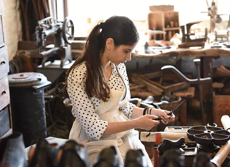 Young woman working with tools