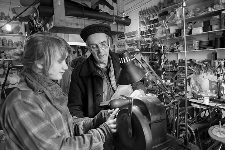 Scotland- Recording the modern heritage craft project.jpg Older man teaching a teenage girl a heritage craft in Scotland