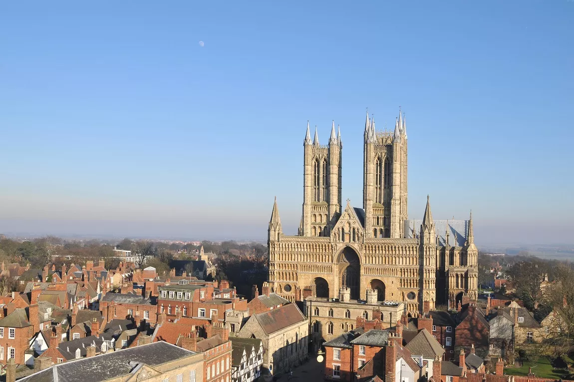 Elevated exterior view of Lincoln Cathedral with the Lincoln skyline in the background 