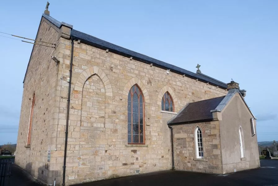 Outside view of St Macartan's - a small church made of stone