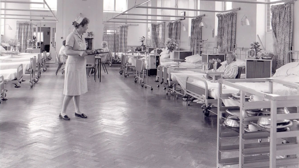 Black and white photograph of a hospital setting